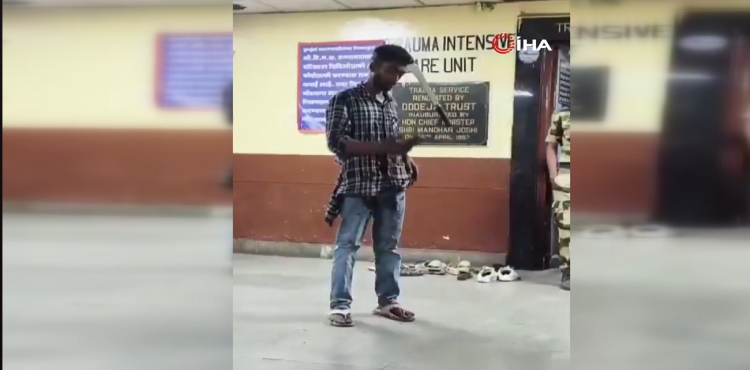 Hindistan'da başına pala saplanan genç telefon kullanmaya devam etti